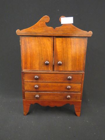 Appraisal: Antique Doll Size Linen Press Mahogany inner drawers and mirror