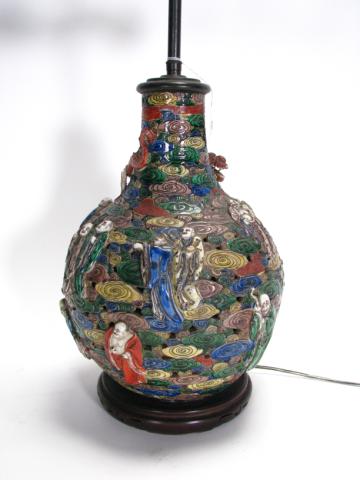 Appraisal: Heavily embossed Oriental base lamp with dragon floral and figural