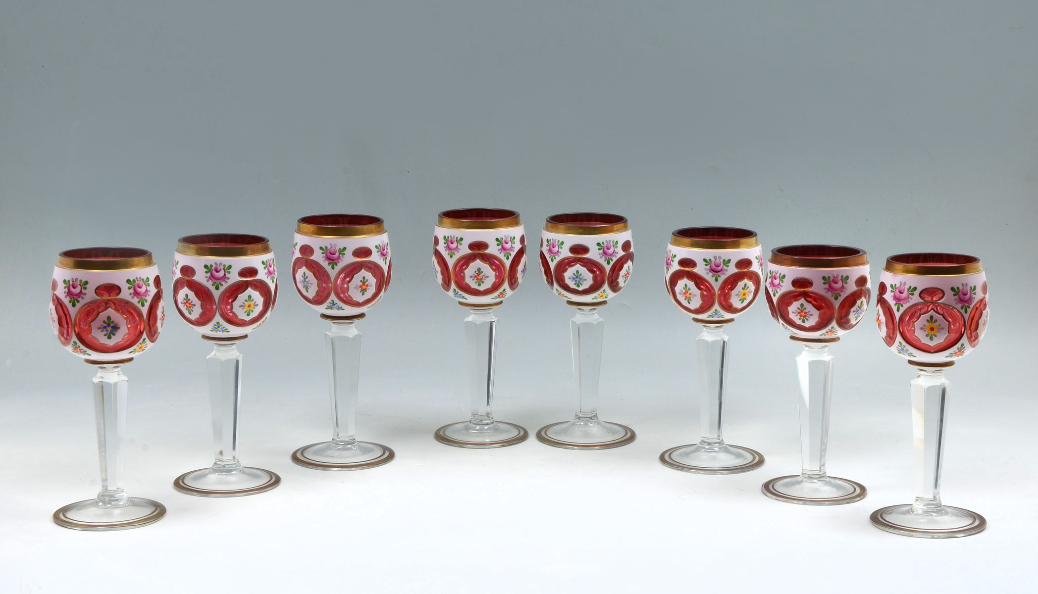 Appraisal: PIECE BOHEMIAN ENAMELED WINE GLASSES white cut to clear wine