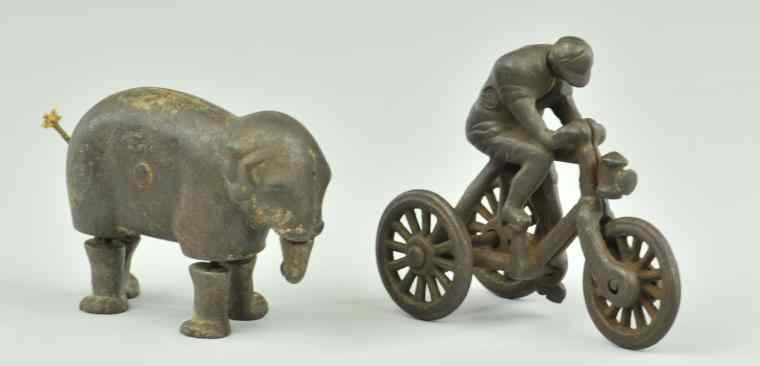 Appraisal: BOY ON TRICYCLE AND IVES ELEPHANT Ideal Mfg rare item