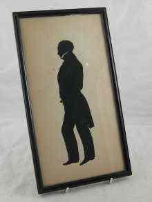 Appraisal: A full length cut silhouette portrait of a gentleman the