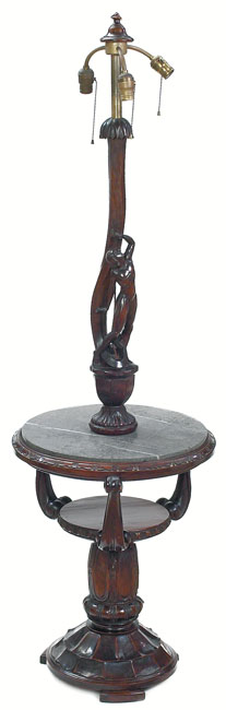 Appraisal: Unusual Art Deco lamp carved figure over a circular marble