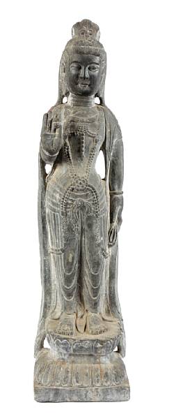 Appraisal: A large gray stone standing figure of Guanyin th Century