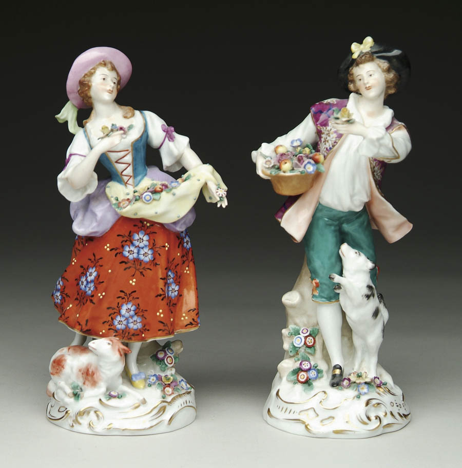 Appraisal: PAIR OF CHELSEA FIGURINES OF BOY AND GIRL h boy