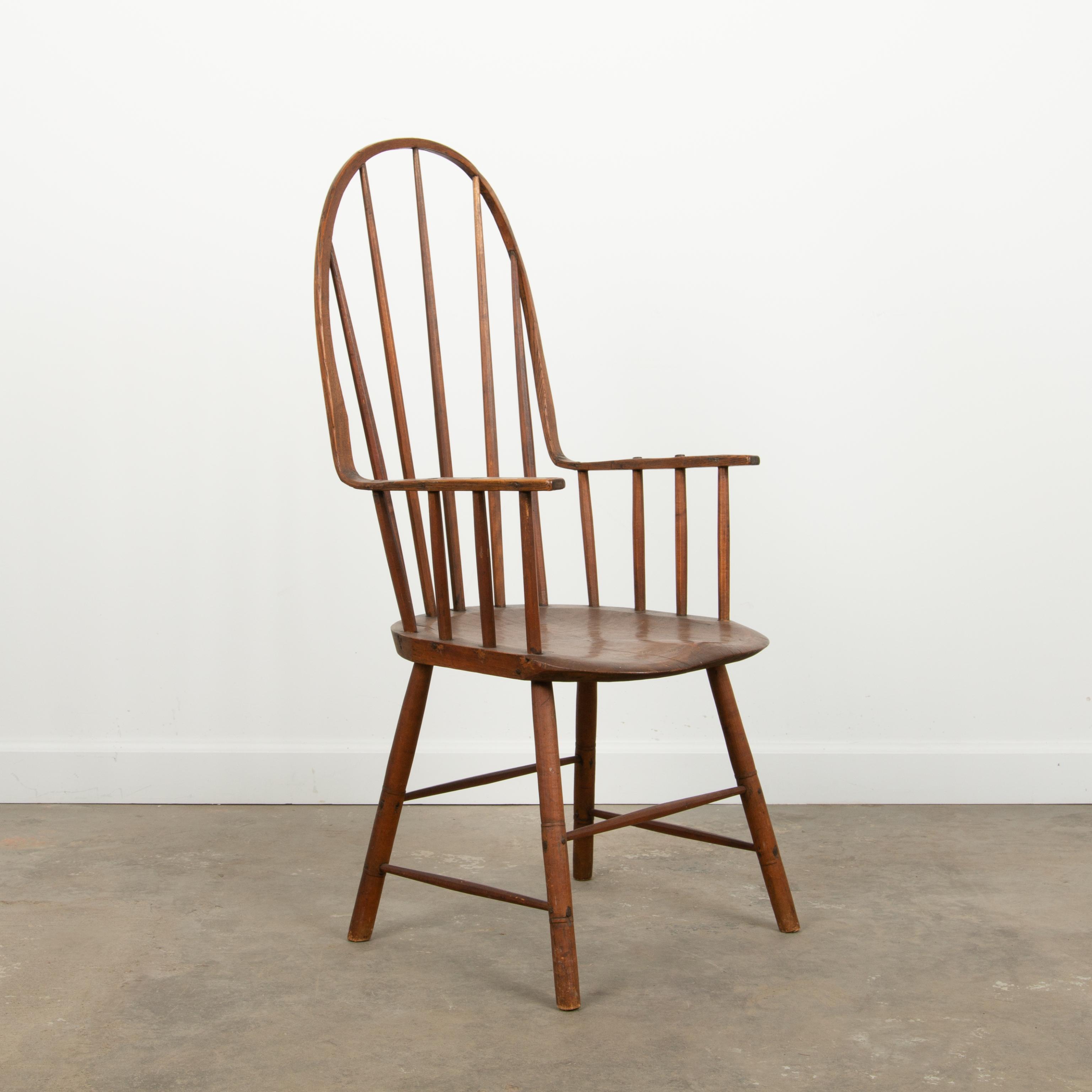 Appraisal: PRIMITIVE CONTINUOUS ARM WINDSOR CHAIR A bentwood continuous arm Windsor