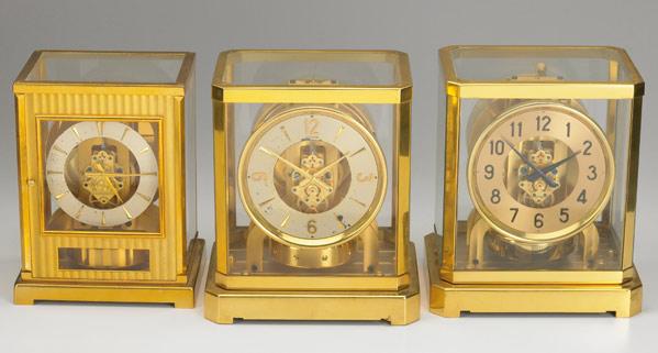 Appraisal: LECOULTRE ATMOS CLOCKS Grouping of three in brass and glass