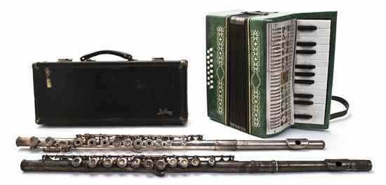 Appraisal: A Collection of Musical Instruments comprising an accordion and two