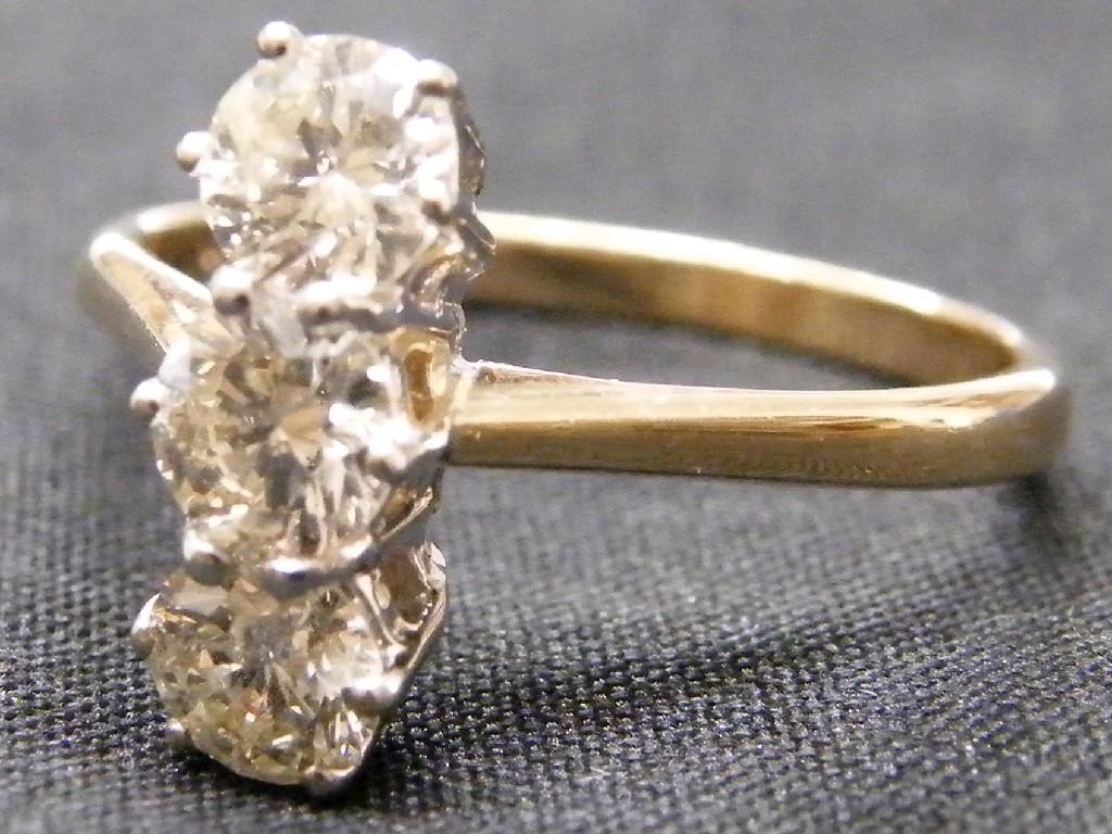 Appraisal: Period ct three stone diamond 'up-finger' ring ct approx in