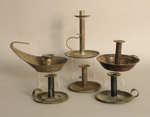 Appraisal: Group of six tin chambersticks and candle holders early th