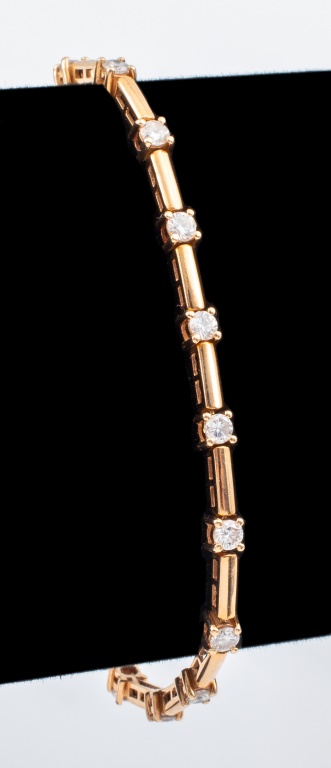 Appraisal: K YELLOW GOLD DIAMOND LINE BRACELET K yellow gold bracelet