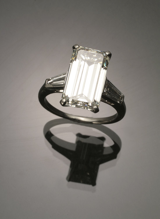 Appraisal: Platinum Solitaire Diamond Ring Set with one rectangular emerald-cut diamond