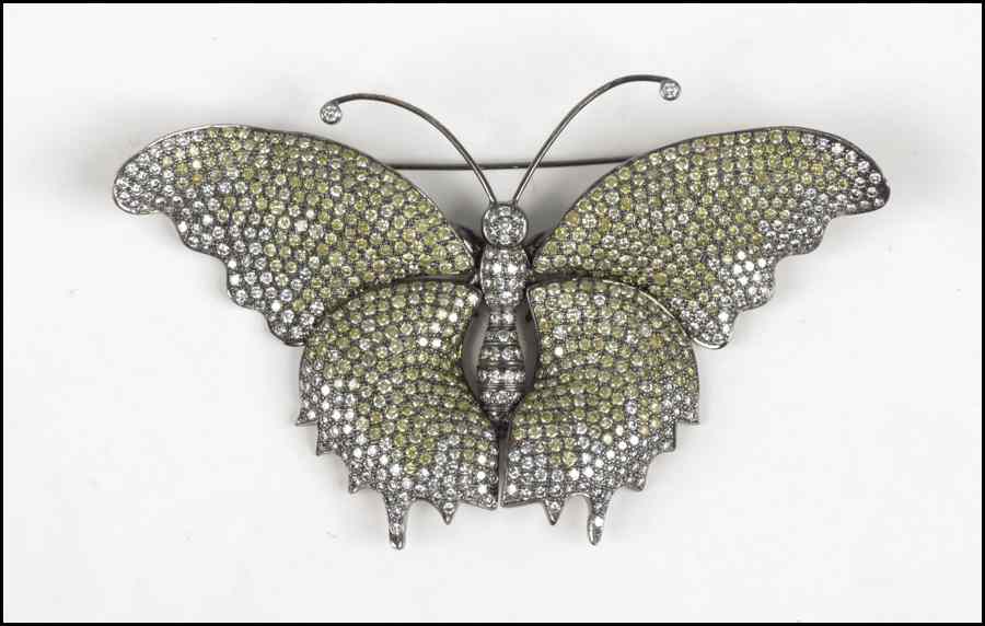 Appraisal: DIAMOND AND KARAT GOLD EN TREMBLANT BUTTERFLY BROOCH Round white