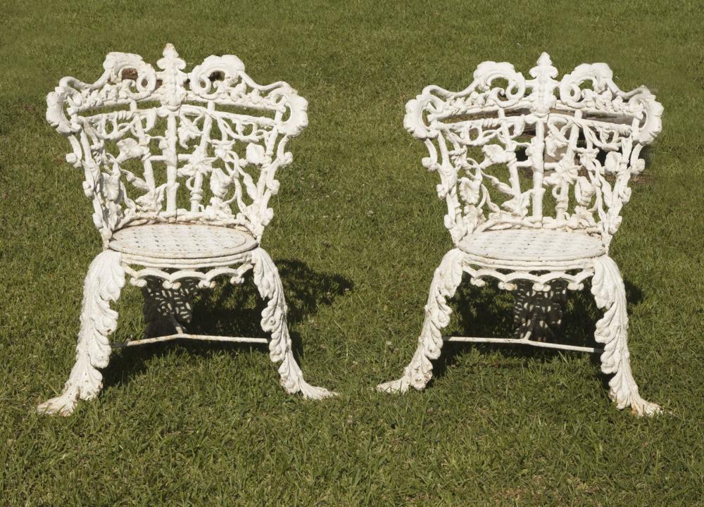 Appraisal: Pair of Victorian Cast Iron Garden Chairs th c entwined