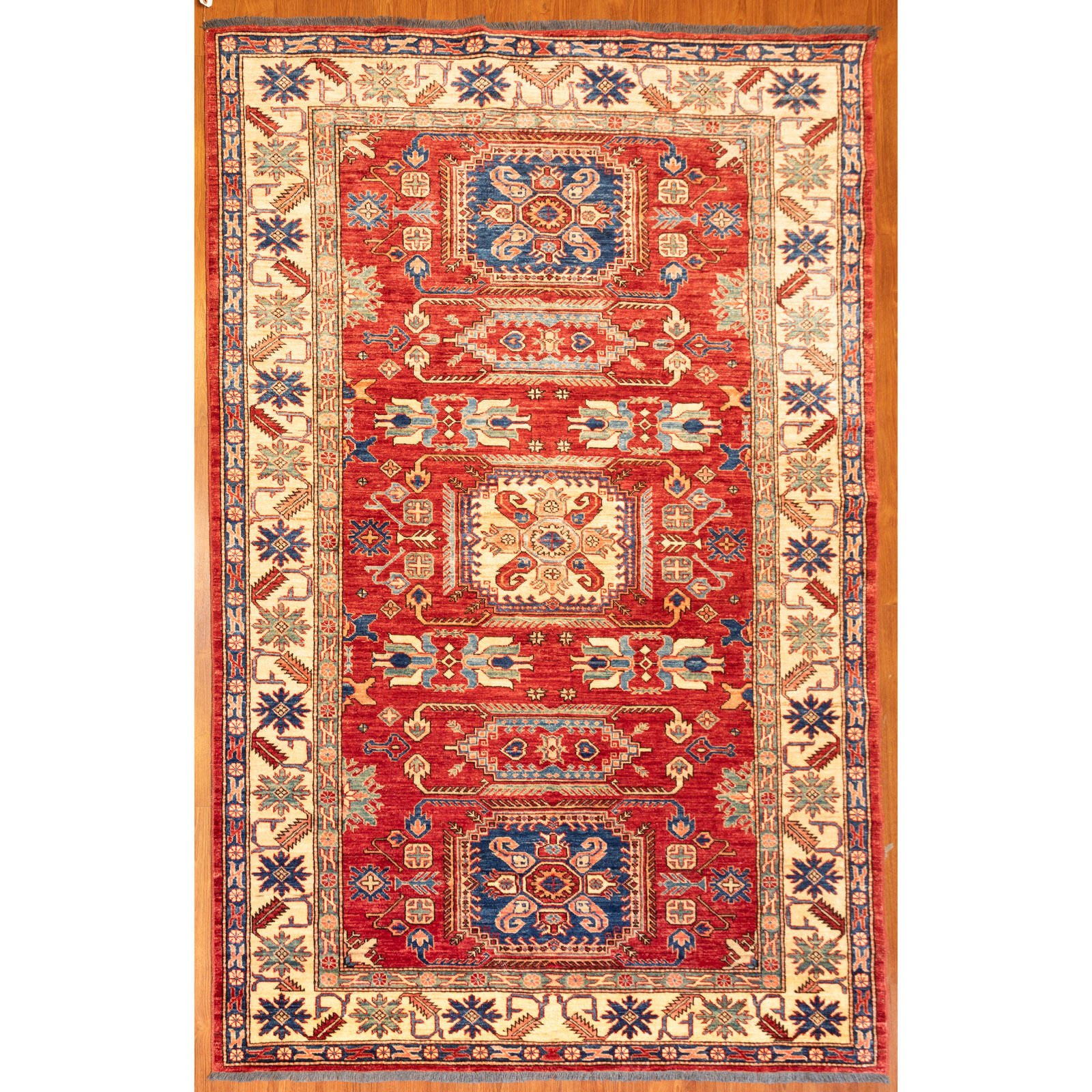 Appraisal: PAK KAZAK RUG PAKISTAN X Fourth quarter- th century hand-knotted