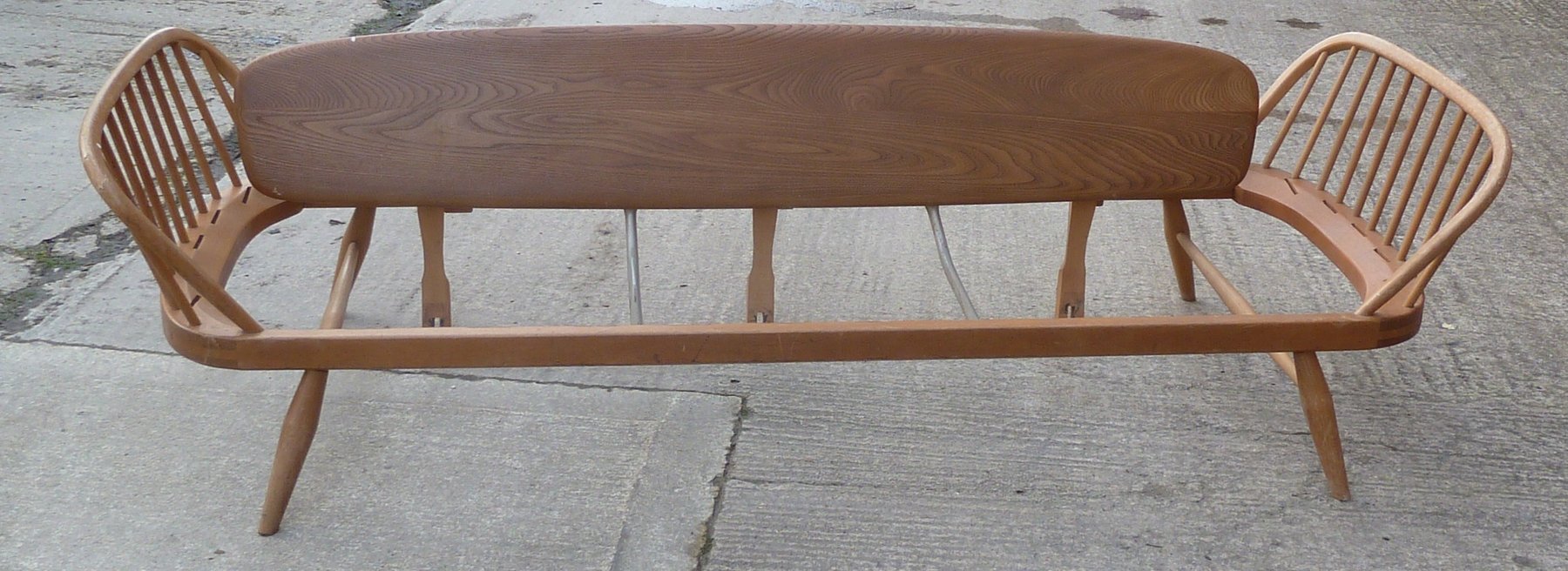 Appraisal: A twin stick back Ercol settee with backboard cm wide