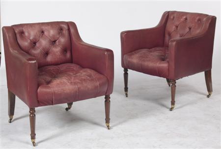 Appraisal: A pair of red leather button back arm chairs each