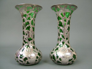 Appraisal: A pair of th century American green glass vases with