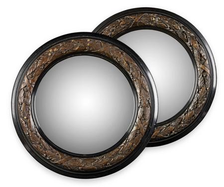 Appraisal: PAIR OF SMALL CARVED EBONISED CONVEX WALL MIRRORS the circular