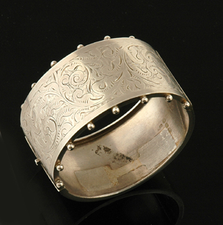 Appraisal: A Victorian sterling silver bangle Circa The sterling silver hinged