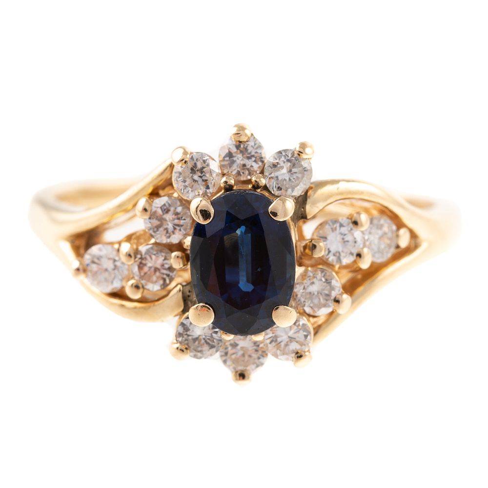 Appraisal: A Sapphire Diamond Halo Ring K K yellow gold ring