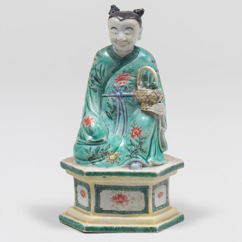 Appraisal: Small Chinese Glazed Porcelain Figure of an Immortal with Basket