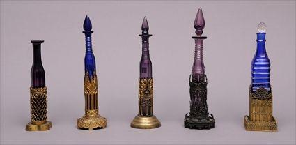 Appraisal: FIVE FRENCH GOTHIC REVIVAL GILT-BRONZE AND PATINATED BRONZE STANDS WITH