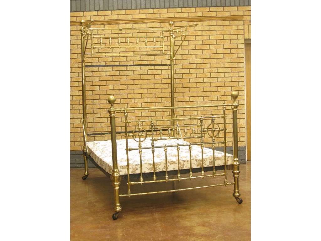 Appraisal: A Victorian brass Half Tester Bed the foot with circular