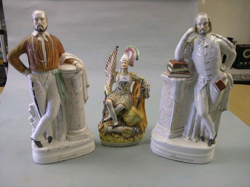 Appraisal: Two Victorian Staffordshire pottery portrait figures Shakespeare and Garibaldi in