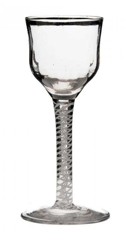 Appraisal: A GEORGE III WINE GLASS the fluted and slightly waisted