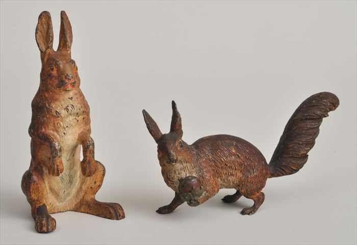 Appraisal: TWO AUSTRIAN COLD-PAINTED METAL FIGURES OF RABBITS One impressed Geschutz