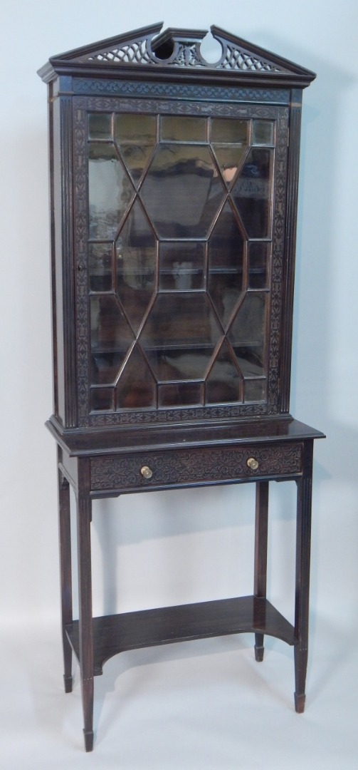 Appraisal: A late Victorian Chippendale revival side cabinet by James Shoolbred