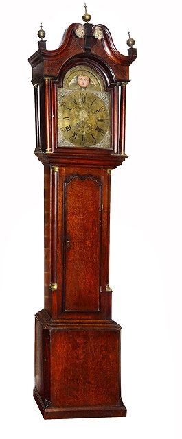 Appraisal: A GEORGE III OAK LONGCASE CLOCK the arched brass dial