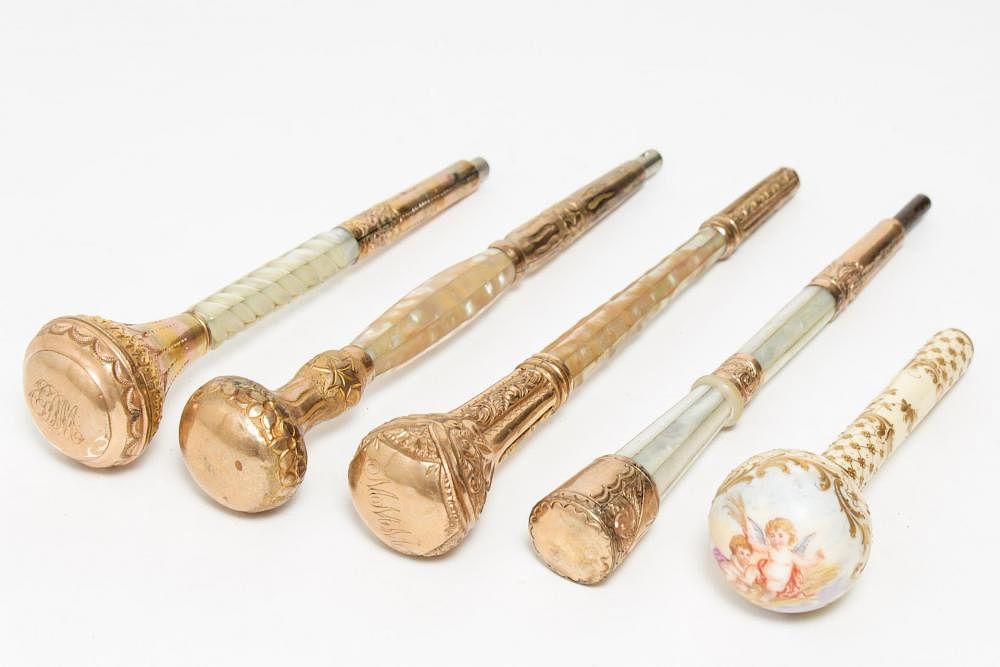 Appraisal: Victorian Parasol Handles Gold Plated Victorian gold-plated parasol handles four