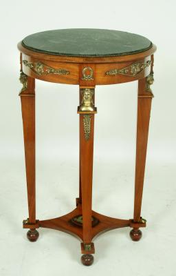 Appraisal: A FRENCH SECOND EMPIRE MAHOGANY AND GILT METAL MOUNTED GUERIDON