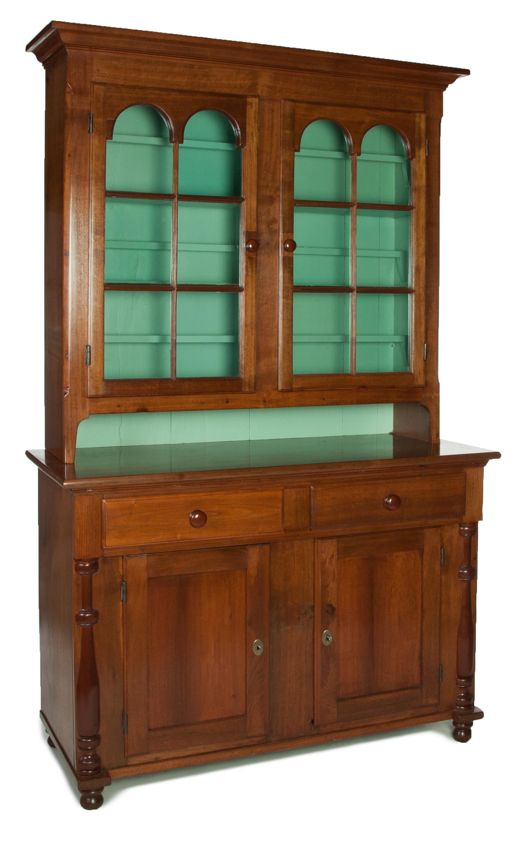 Appraisal: STEPBACK CUPBOARD American walnut Molded cornice two six-pane glass doors