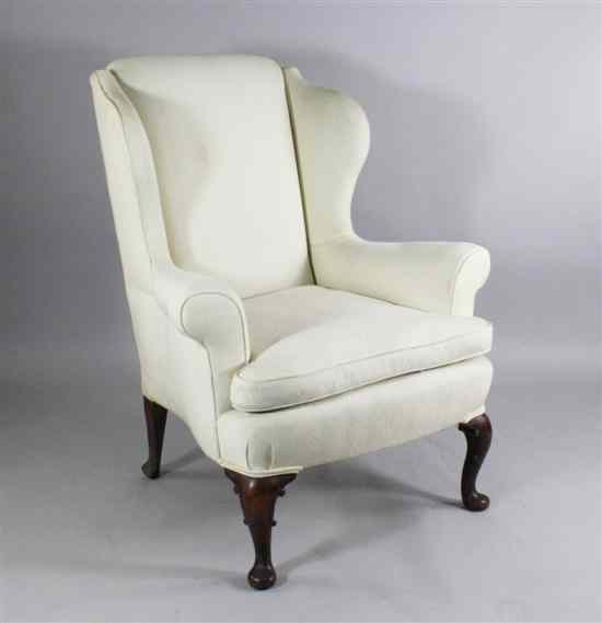 Appraisal: A pair of George II design carved wing armchairs on