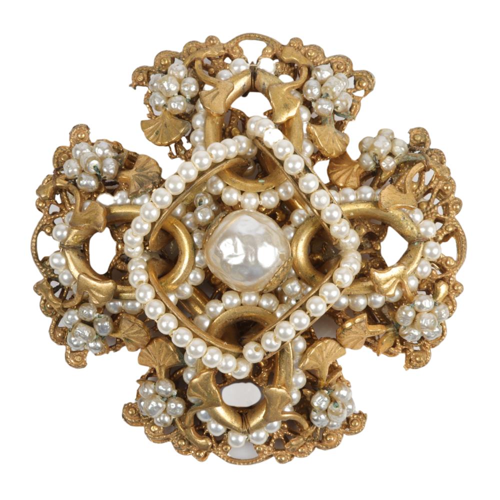 Appraisal: MIRIAM HASKELL LARGE ORNATE DIMENSIONAL BRASS AND PEARL MALTESE CROSS