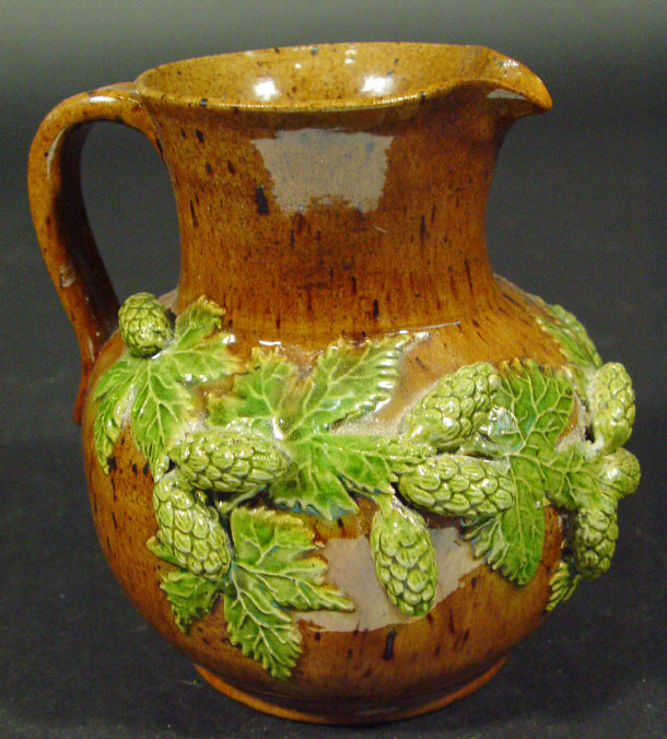 Appraisal: Bognor Rye Pottery style jug relief moulded with green hops