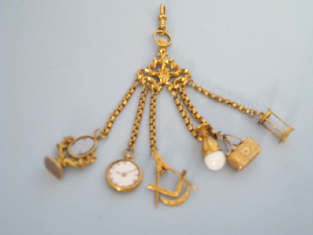 Appraisal: An early th Century Chatelaine with miniature casket pocket watch