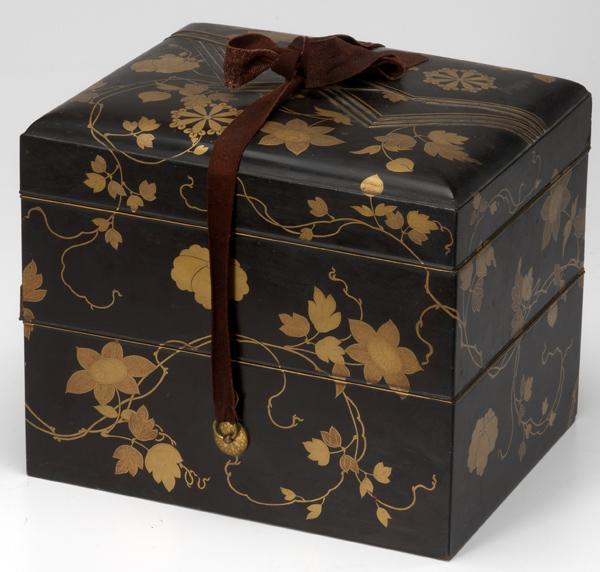 Appraisal: JAPANESE LACQUER Domed box decorated with mons and flowering tendrils