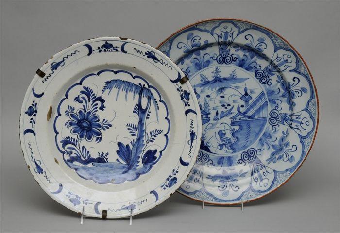 Appraisal: TWO DELFT BLUE AND WHITE CHARGERS Each with underglaze-blue three-letter