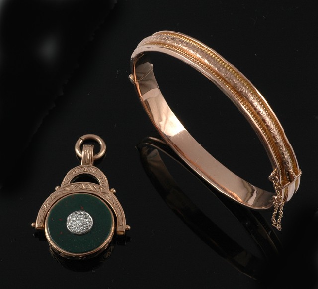 Appraisal: AN EDWARDIAN GOLD BANGLE AND A DIAMOND SET FOB Circa