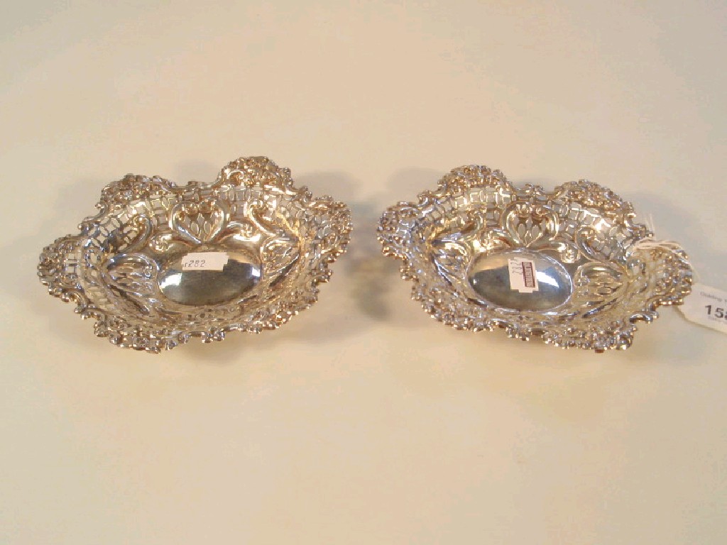 Appraisal: A pair of late Victorian silver bonboniers shaped oval design