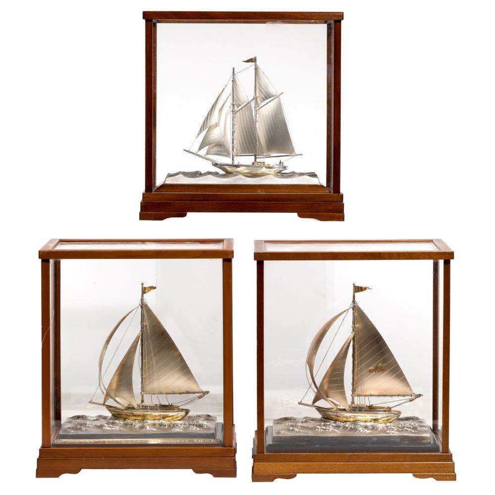 Appraisal: STERLING SILVER SAILBOAT ASSORTMENT items having gilt flags including a