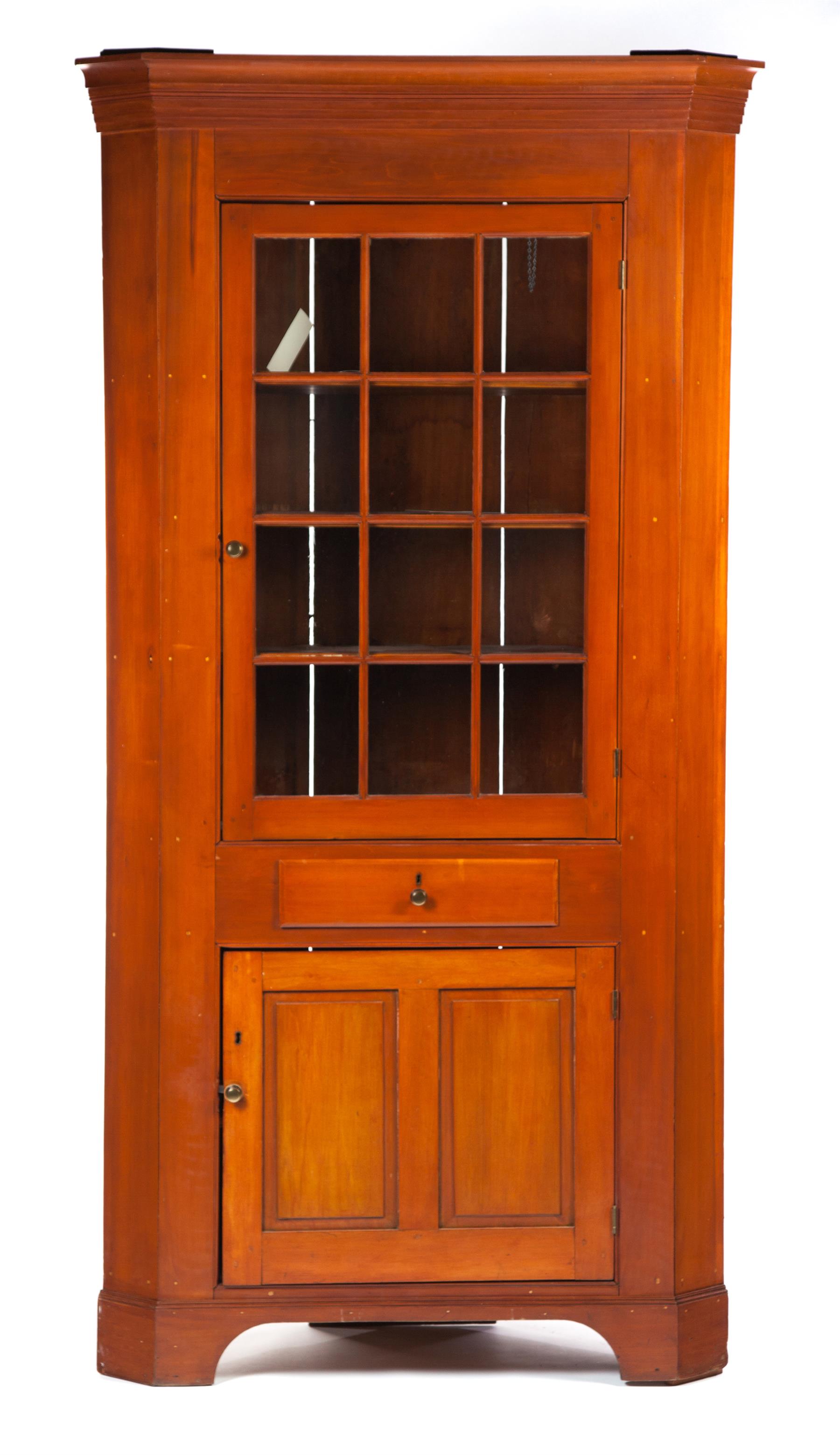 Appraisal: ONE-PIECE CHERRY CORNER CUPBOARD American nd half- th century Stepped