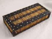 Appraisal: A porcupine quill and ebony mounted mahogany box with sliding