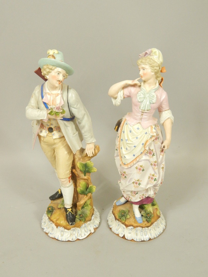 Appraisal: A pair of German late thC porcelain figures modelled as