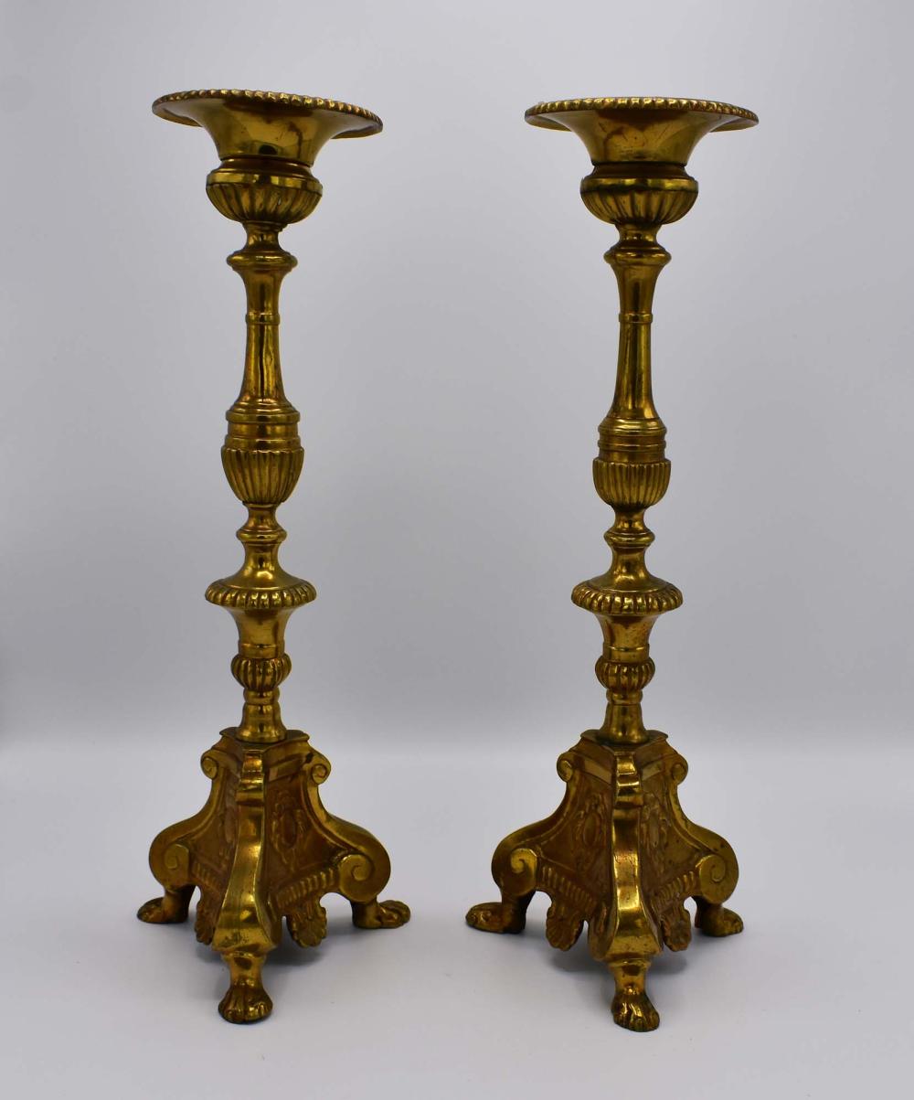 Appraisal: PAIR OF CONTINENTAL BAROQUE STYLE BRONZE CANDLESTICKSLate th Early th