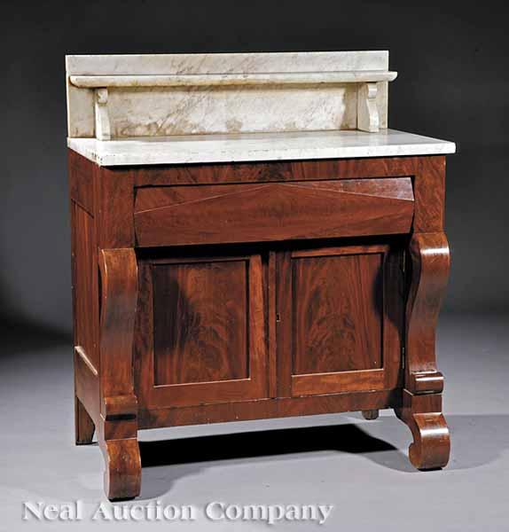 Appraisal: An American Classical Mahogany Washstand c the marble top with