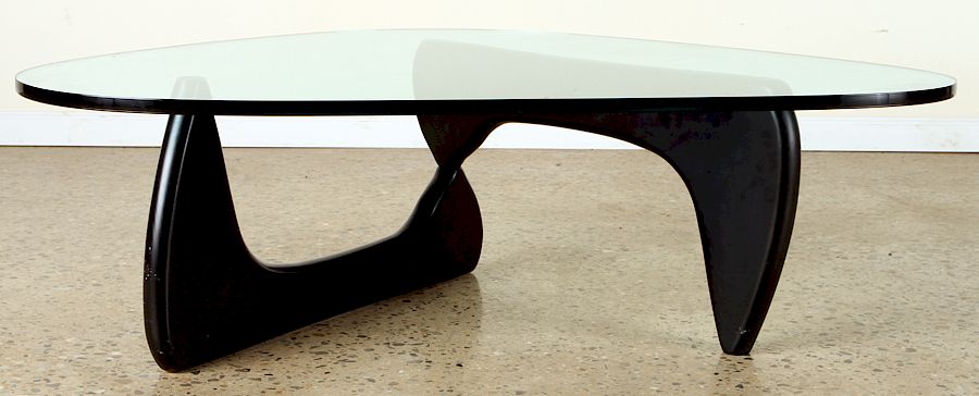 Appraisal: EBONIZED WOOD GLASS COFFEE TABLE BY NOGUCHI An ebonized wood